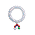 Bridging coil hair tie with charm